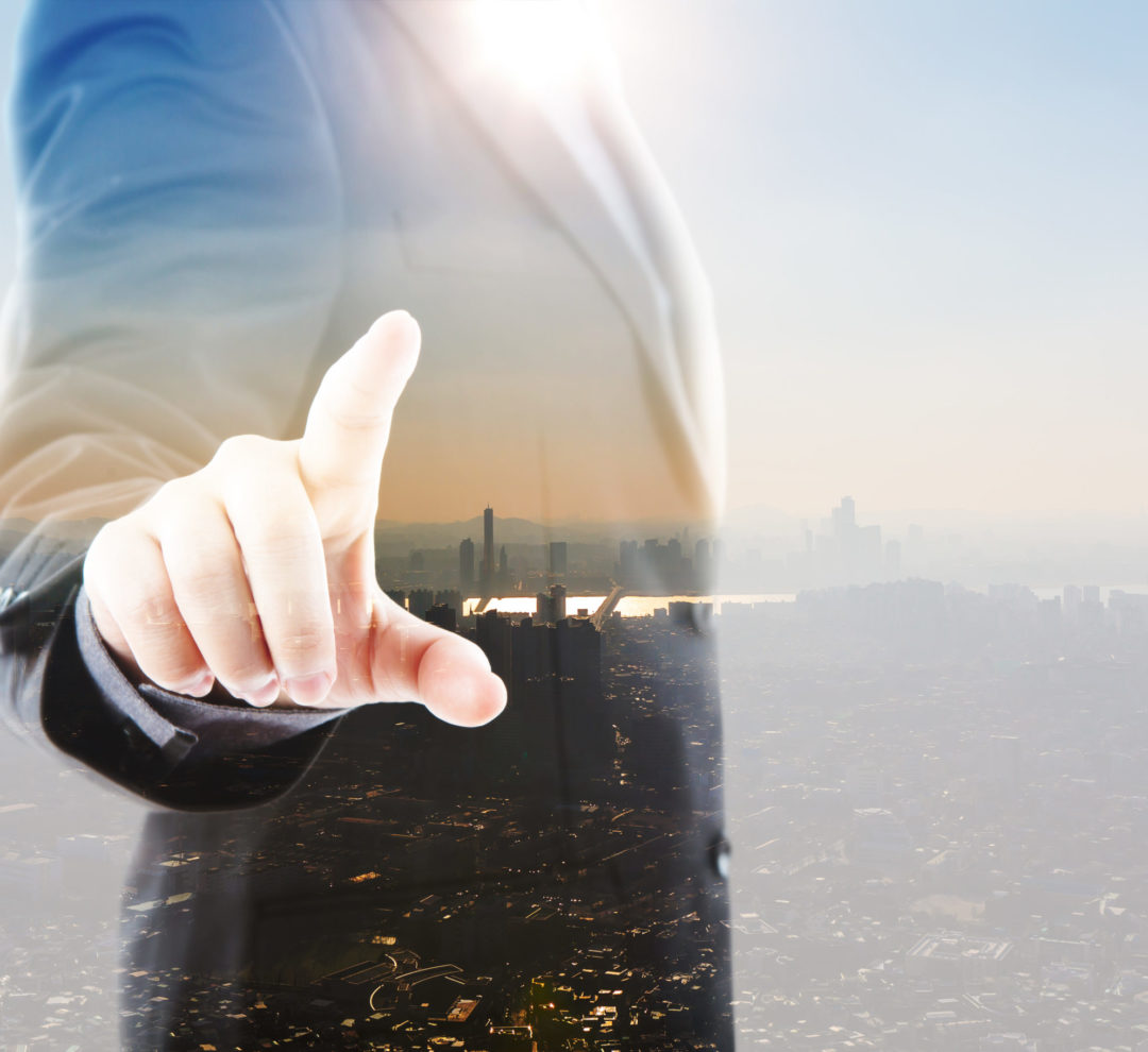 Abstract Double exposure of Business man touching an imaginary s Abstract Double exposure of Business man touching an imaginary screen against white background
